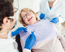 Woman smiling in the dental chair